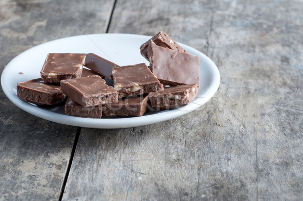 Foto stock: Chocolate · avelã · mesa · de · madeira · foto · comida