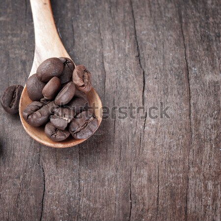 almonds in  bowl on grained wood background Stock photo © nessokv