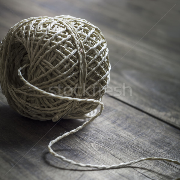 Ball of string on wooden background Stock photo © nessokv