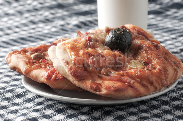 	Photo of delicious slice of pizza with olive Stock photo © nessokv
