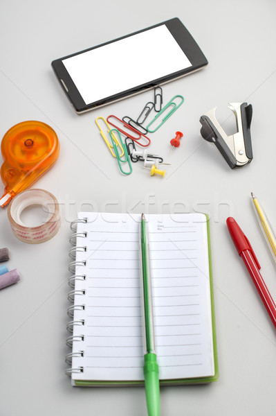 école matériaux crayons ordinateurs portables agrafeuse [[stock_photo]] © nessokv