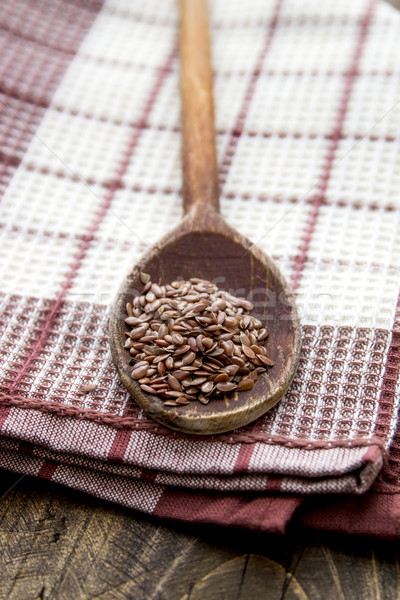 wooden spoon with flax seed Stock photo © nessokv