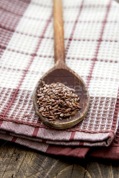 Stock photo: wooden spoon with flax seed