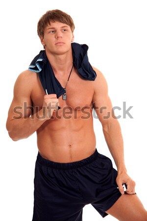 Wrestler in a blue singlet. Studio shot over white. Stock photo © nickp37