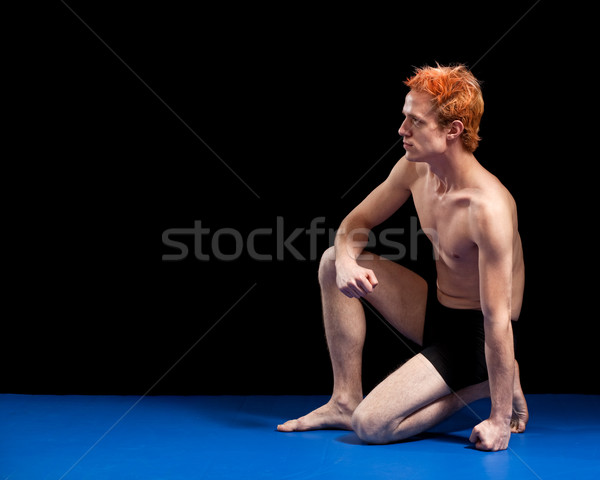 Mixed martial artist. Studio shot over black. Stock photo © nickp37