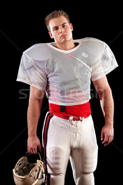 American football player. Studio shot over black. Stock photo © nickp37