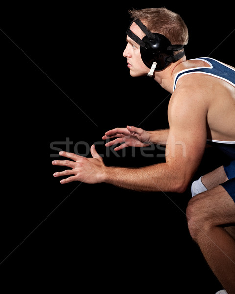 Wrestler in a blue singlet. Studio shot over black. Stock photo © nickp37