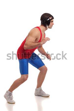 Young adult male wrestler. Studio shot over white. Stock photo © nickp37