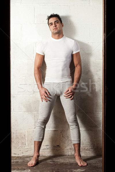 Man in long underwear and white compresion shirt. Stock photo © nickp37