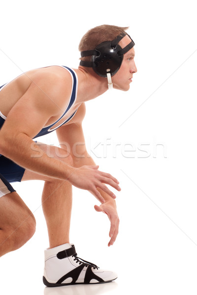 Wrestler in a blue singlet. Studio shot over white. Stock photo © nickp37