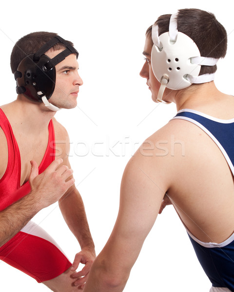 Two male wrestlers. Studio shot over white. Stock photo © nickp37