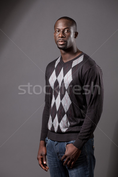 Casual male model. Studio shot over grey. Stock photo © nickp37