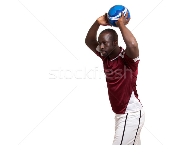 Male soccer player. Studio shot over white. Stock photo © nickp37