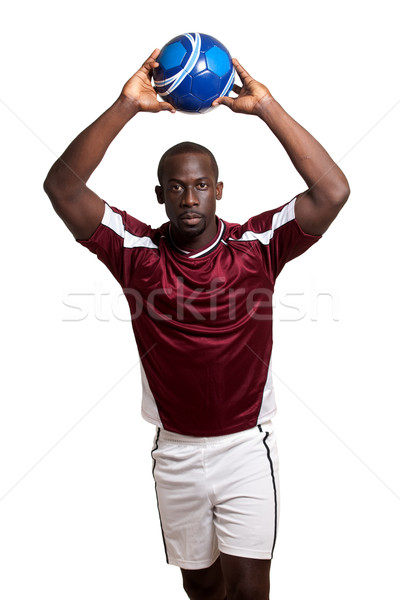 Male soccer player. Studio shot over white. Stock photo © nickp37