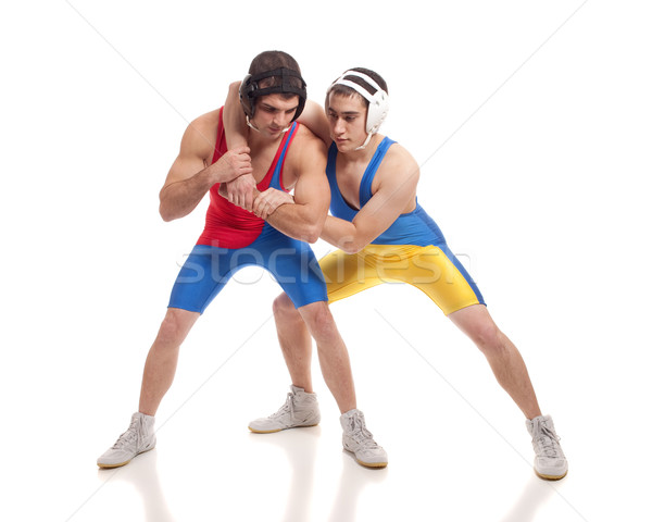 Two male wrestlers. Studio shot over white. Stock photo © nickp37