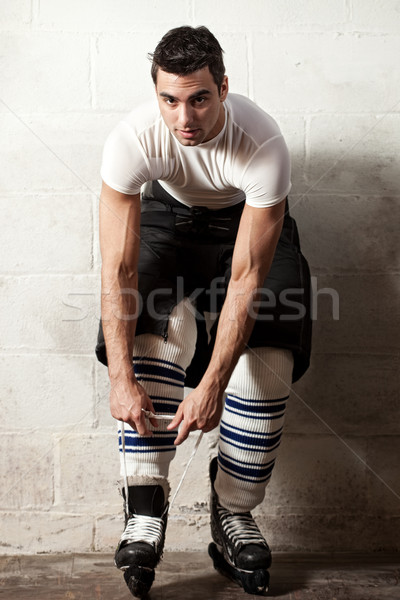 Hockey sobre hielo jugador concretas pared hombre Foto stock © nickp37