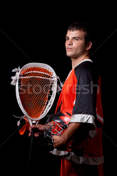 Male lacrosse player. Studio shot over black. Stock photo © nickp37