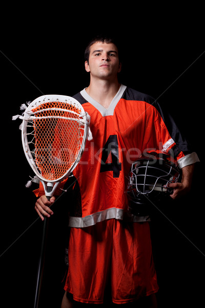 Male lacrosse player. Studio shot over black. Stock photo © nickp37