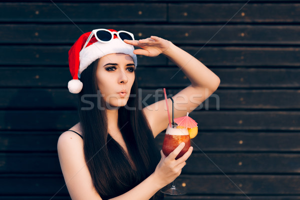Girl looking for Someone at a Christmas Party Stock photo © NicoletaIonescu