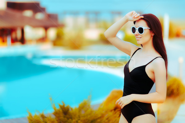 Summer Girl with Fashion Sunglasses and Black Swimsuit by the Pool Stock photo © NicoletaIonescu