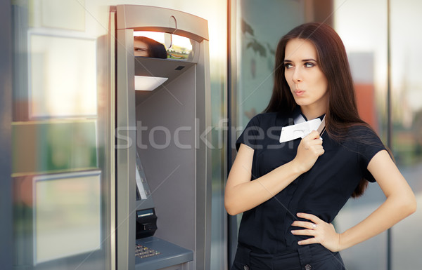 Surprised Businesswoman with Credit Card at ATM cash machine Stock photo © NicoletaIonescu