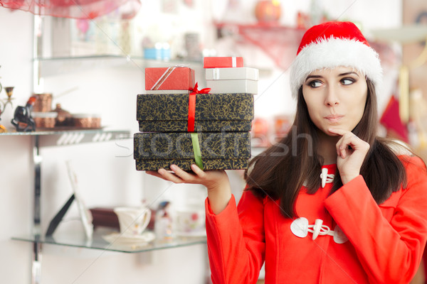 любопытный Рождества девушки представляет подарок магазин Сток-фото © NicoletaIonescu
