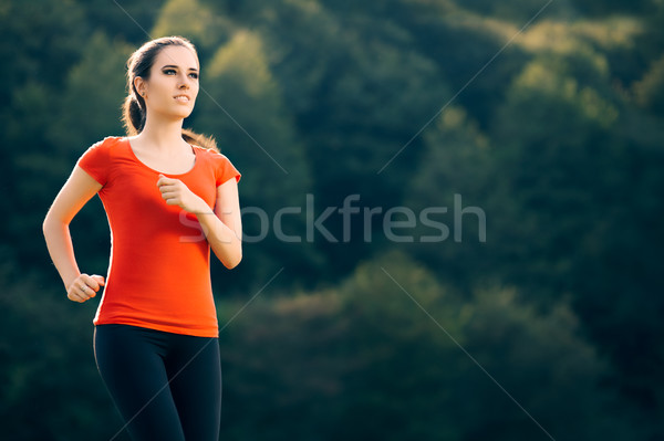 Happy Fit Sportive Woman Running Outside  Stock photo © NicoletaIonescu