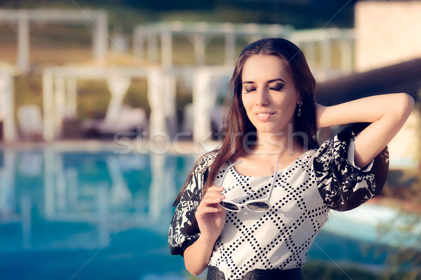 Stock photo: Happy Woman by the Pool Enjoying Summer Holiday