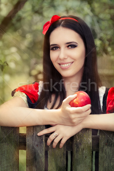 Snow White Holding a Red Apple Fairy Tale Portrait  Stock photo © NicoletaIonescu