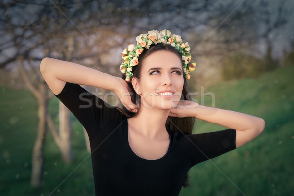 Happy Girl with Floral Wreath in Nature Stock photo © NicoletaIonescu