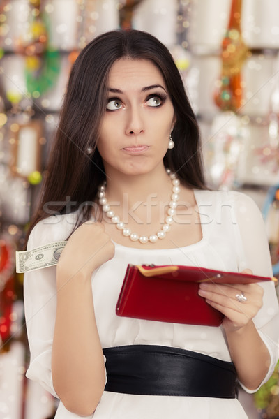 Cute Broke Woman at  Shopping Checking Wallet Stock photo © NicoletaIonescu