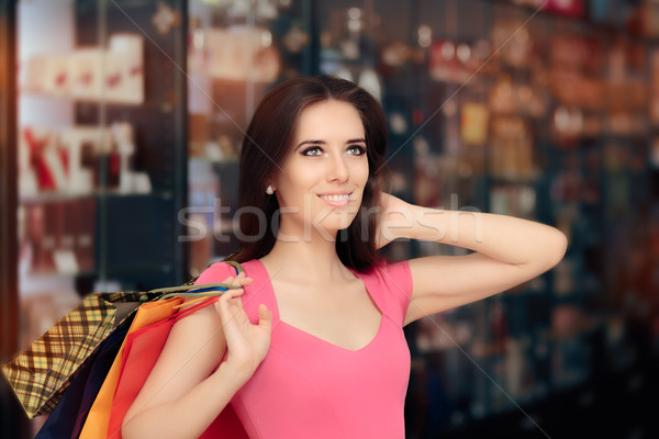 Feliz mujer compras tienda sonriendo nina Foto stock © NicoletaIonescu