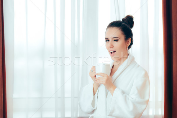 Stock photo: Woman in Bathrobe Starting Morning with a Cup of Coffee