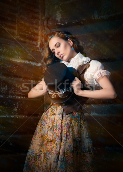 Steampunk Girl with Top Hat and Aviator Glasses  Stock photo © NicoletaIonescu