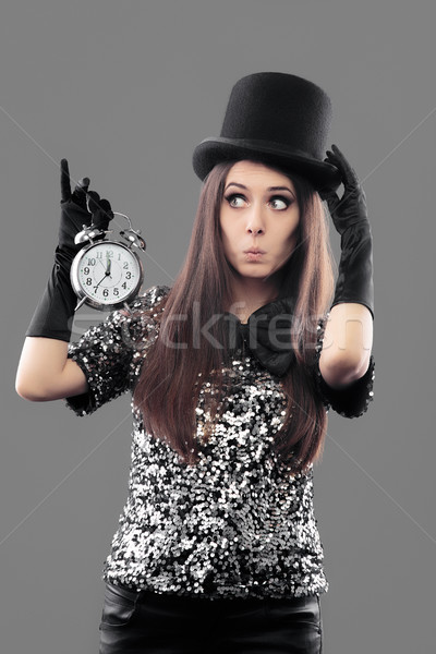 Surprised Woman with Top Hat and Alarm Clock on New Year Stock photo © NicoletaIonescu