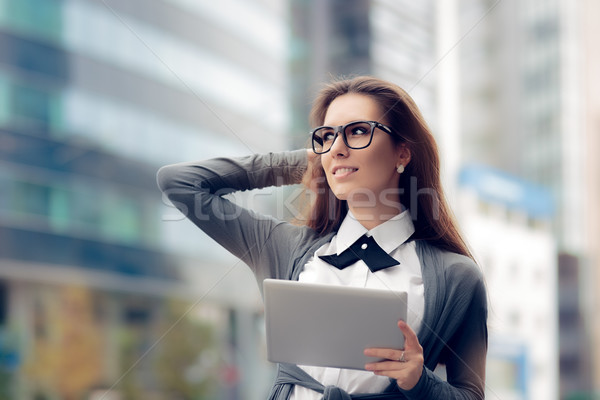 Urban Woman Wearing Glasses Holding  PC Tablet  Stock photo © NicoletaIonescu