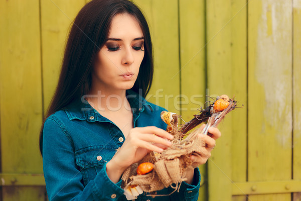 Thinking  Girl Holding Decorative Autumn Wreath Stock photo © NicoletaIonescu