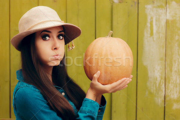 Stock photo: Funny Autumn Woman Holding Pumpkin