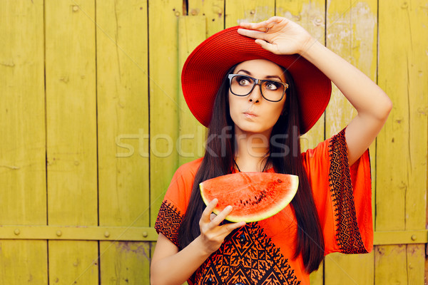 Surprised Woman with Glasses Holding Watermelon Slice Stock photo © NicoletaIonescu