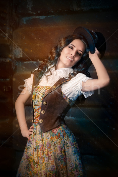 Steampunk Girl with Top Hat and Aviator Glasses  Stock photo © NicoletaIonescu