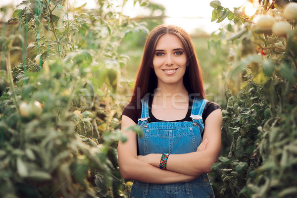Happy Countryside Woman Proud of Her Vegetable Greenhouse Garden Stock photo © NicoletaIonescu