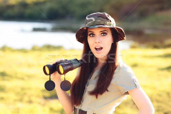 Surprised Explorer Girl with Camouflage Hat and Binoculars  Stock photo © NicoletaIonescu