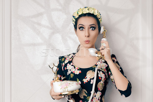 Surprised Retro Woman With Vintage Phone Stock photo © NicoletaIonescu