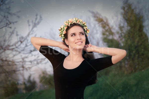 Happy Girl with Floral Wreath in Nature Stock photo © NicoletaIonescu