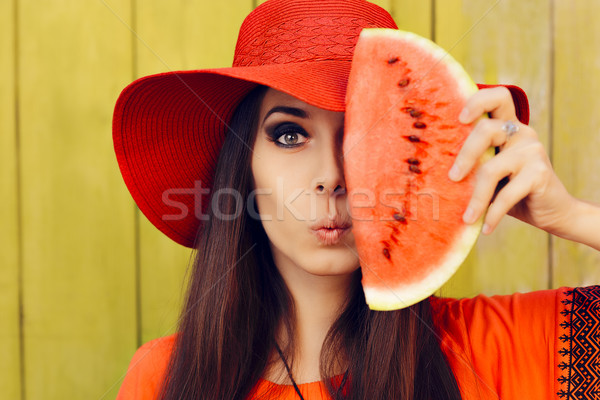 Surprised Woman in Red Hat with Watermelon Slice Stock photo © NicoletaIonescu