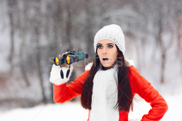 Surprised Winter Woman with Binoculars Looking for Christmas Stock photo © NicoletaIonescu