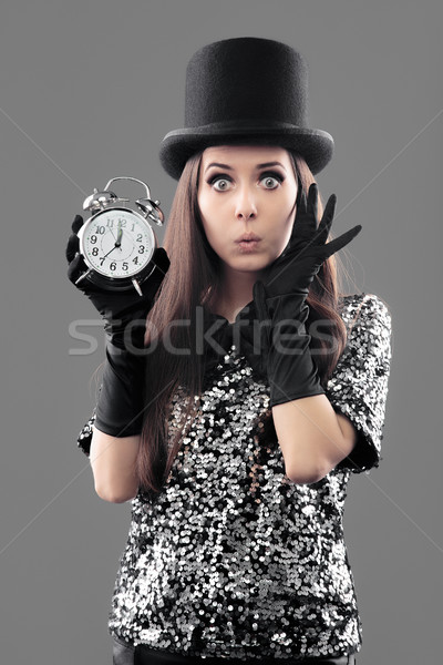 Surprised Woman with Top Hat and Alarm Clock on New Year Stock photo © NicoletaIonescu
