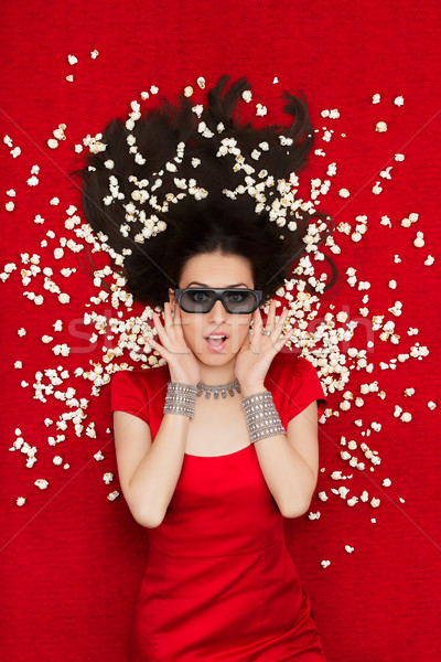 Sorpreso ragazza 3D cinema occhiali popcorn Foto d'archivio © NicoletaIonescu