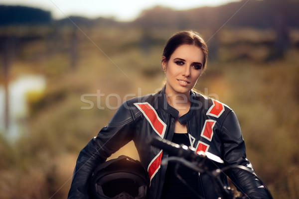 Stock photo: Female Motocross Racer Next to Her Motorcycle 