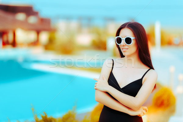 Summer Girl with Fashion Sunglasses and Black Swimsuit by the Pool Stock photo © NicoletaIonescu